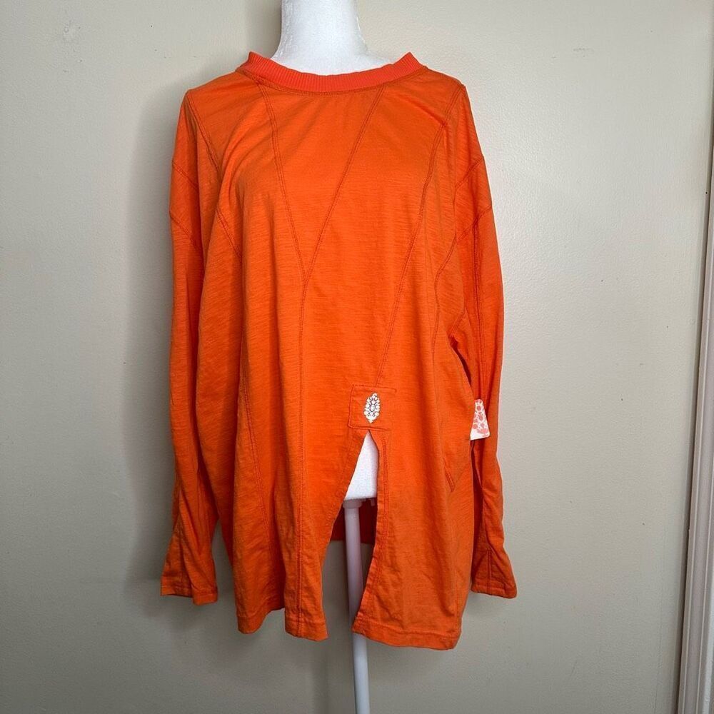 NWT FP Free People Movement Orange Oversized Side Slit Top Long Sleeves sz Large